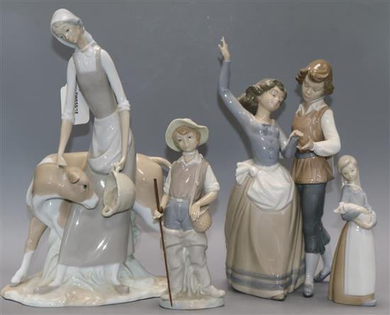 A Lladro group, Folk Dancing, No. 5256 and three other figures, H 34cm (tallest)